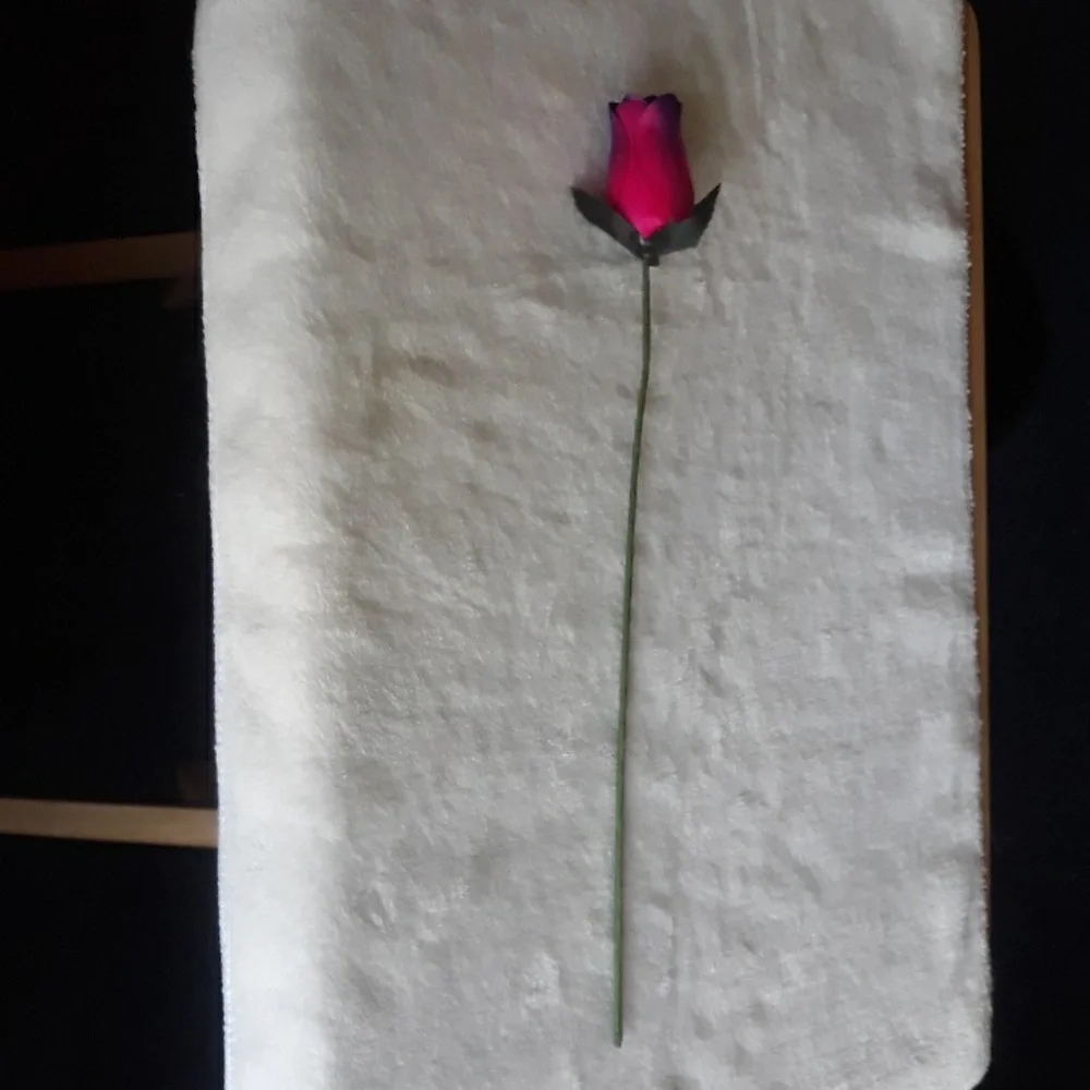 Wooden rose, pink and purple. 13 inches long.